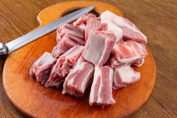 Raw food pork meat cooking,  wood  protein. stock photo