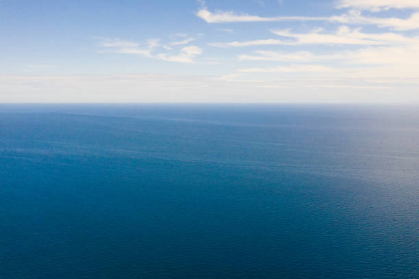 istock Seascape, view from above.Blue sea and sky with clouds 1161147209