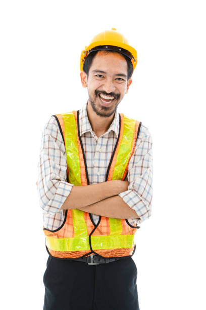 istock Engineer man cross arm orange helmet and vest 1161147536