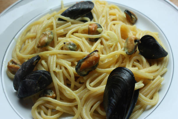 istock Spaghetti served with mussel cream 1161147779
