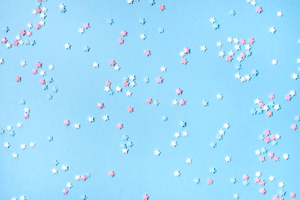 Little stars confetti on blue background