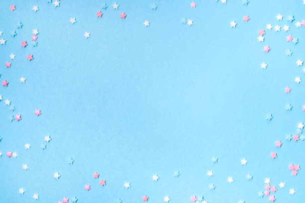 istock Little stars confetti on blue background 1161147862