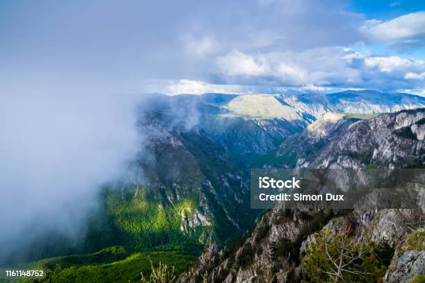 Montenegro Wet Rain Clouds Coming Quickly Over Tara River Canyon Nature Scenery At Dawn From Above Mountain Top Curevac Providing Endless View Over Rocky Gorge Stock Photo - Download Image Now