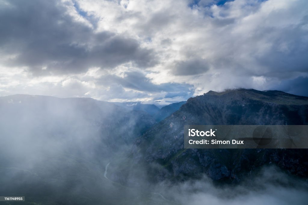 Montenegro, Above spectacular tara river canyon nature landscape of durmitor national park near zabljak from peak of mount curevac in foggy dawning atmosphere Alpine climate Stock Photo