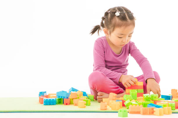 istock little girl playing 1161151206