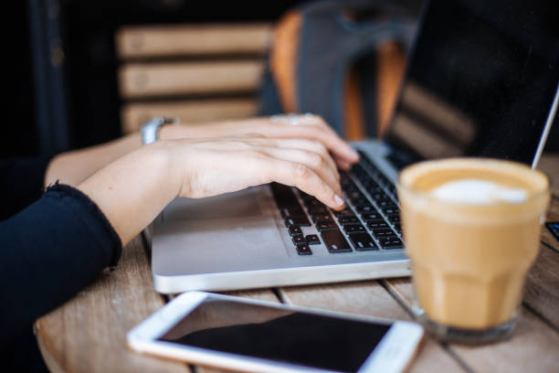 istock Woman typing on laptop 1161151594