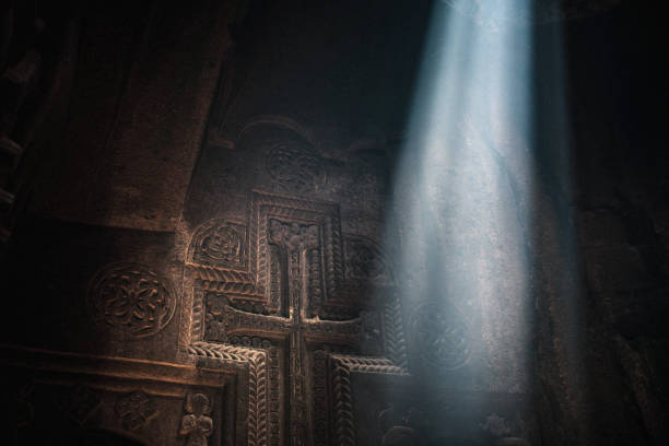 ray of hope. sunbeam at aged temple - cross cross shape christianity hope imagens e fotografias de stock