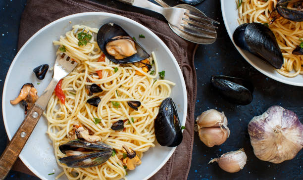 istock Spaghetti with mussels and tomatoes 1161155132