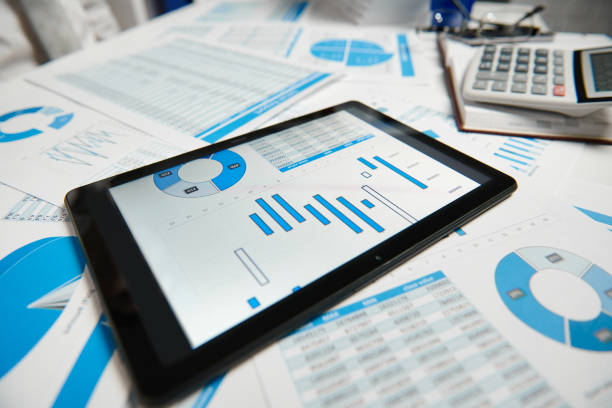 istock Office workspace for business. Tablet pc and reports. Table closeup. Business financial accounting concept. 1161157799