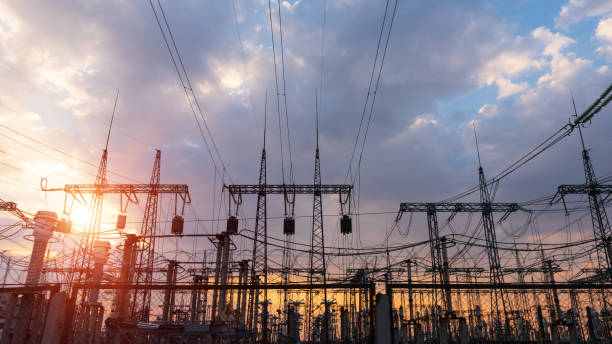 istock high-voltage power lines at sunset. electricity distribution station . 1161157931