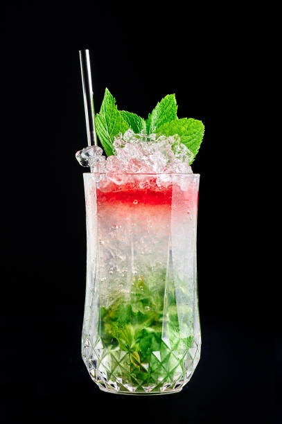 istock strawberry layered mojito isolated at black background. 1161157979