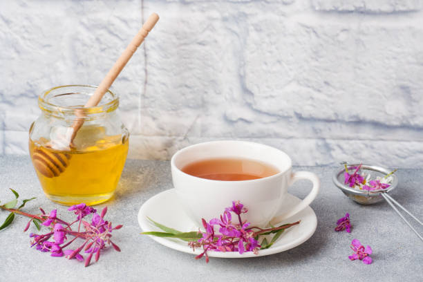 istock Useful herbal tea from fermented leaves fireweed on grey background. Traditional Russian Koporye Tea Ivan Chai Copy space. 1161160845