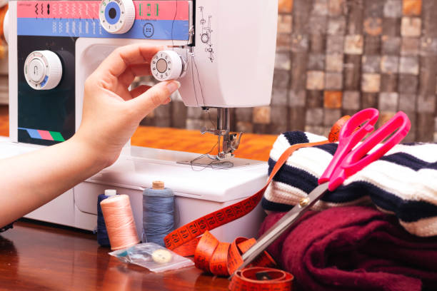 istock closeup women sewing on a machine 1161161771