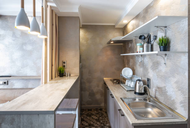 Kitchen interior in a small studio room stock photo