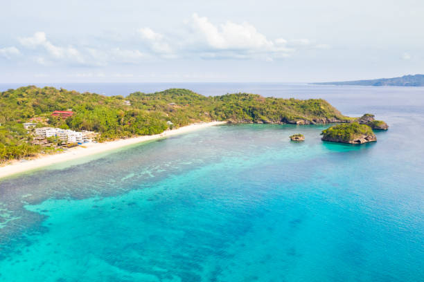 istock Ilig Iligan Beach. White sand beach and clear coral lagoon 1161164712