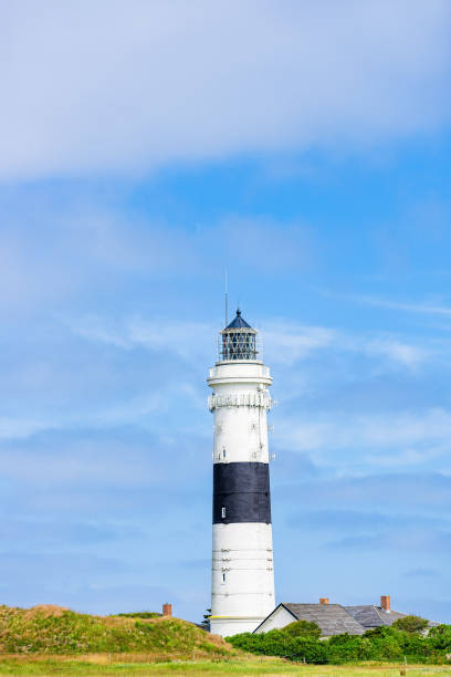 istock Lighthouse black white on dune. Sylt island – North Germany. 1161168586
