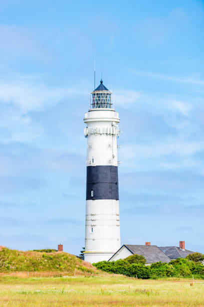 istock Lighthouse black white on dune. Sylt island – North Germany. 1161168613