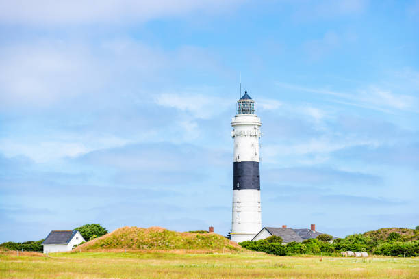 istock Lighthouse black white on dune. Sylt island – North Germany. 1161168614