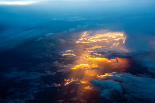 istock Aerial view of a cloudy sunset while flying above the clouds 1161171117