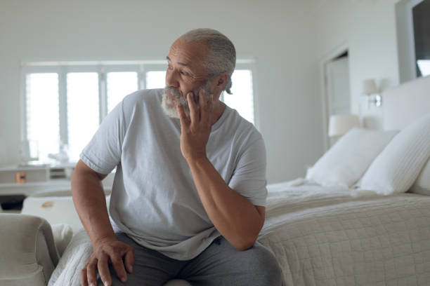 istock Man sitting on the bed 1161172319