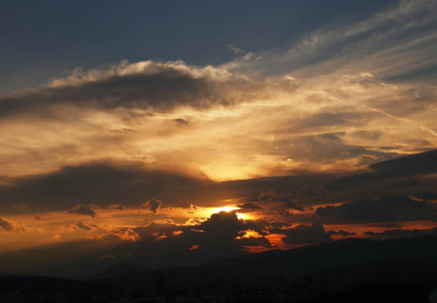 istock beautiful golden sunset sky landscape 1161175225
