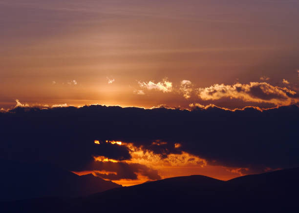 istock beautiful golden sunset sky landscape 1161175286