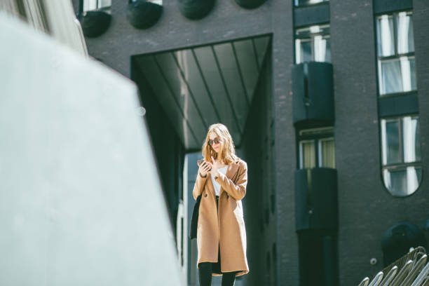 istock Young businesswoman coming from work 1161176435