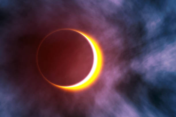 istock Amazing scientific background - total solar eclipse in dark red glowing sky, mysterious natural phenomenon when Moon passes between planet Earth and Sun. 3D illustration. 1161177791