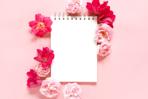 istock Natural template with blank notepad and various vintage roses 1161178064