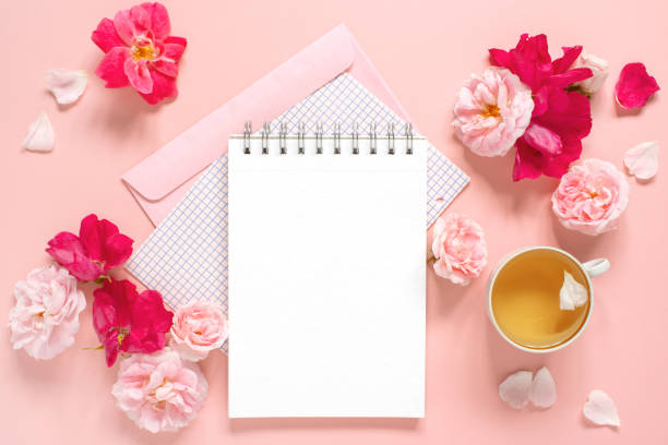 istock Natural template with blank notepad and various pink vintage roses 1161178069