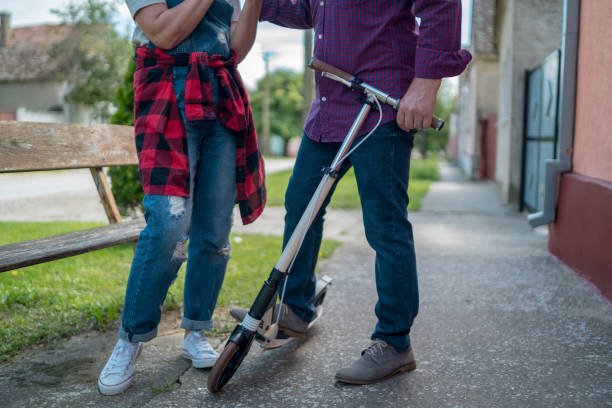 istock couple on an scooter 1161180519