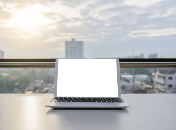 istock Notebook Laptop in the office The background is a building. 1161180822