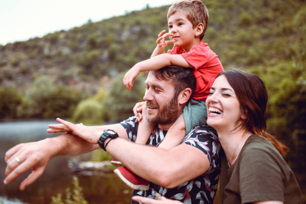 istock Cute Family Having Fun In Forest 1161181135