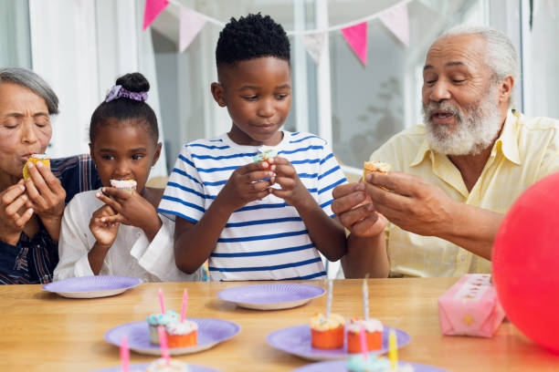 istock Family eating cupcakes 1161187918