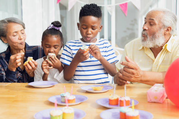 istock Family eating cupcakes 1161187968