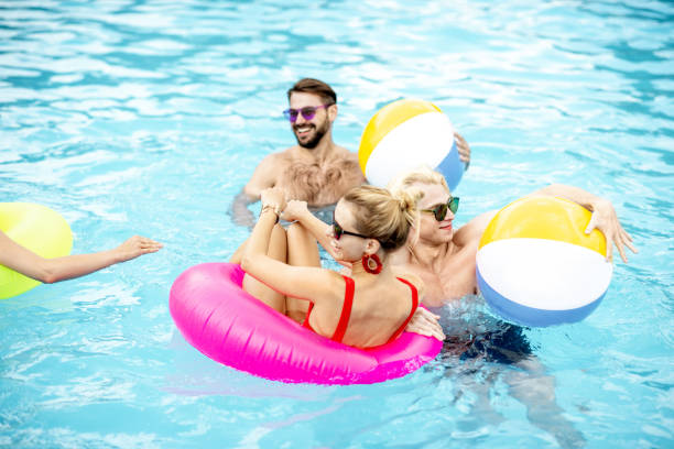 istock Friends in the swimming pool 1161190713