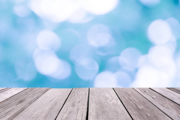 istock Old wooden floor with blue blurred background. 1161191259