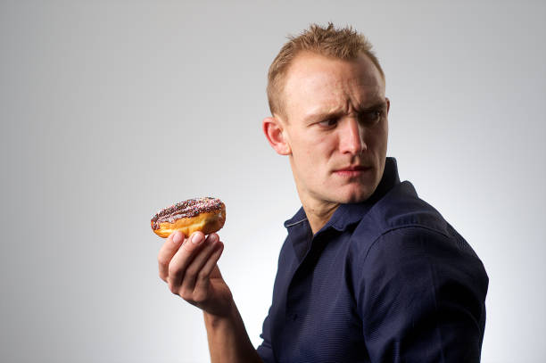 istock Caught in the act Donut Diet Guilt 1161192569