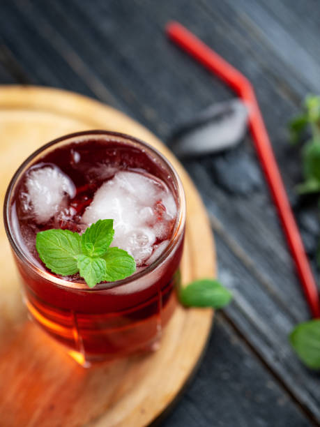 istock Red alcoholic cocktail with ice and mint in a glass 1161195387