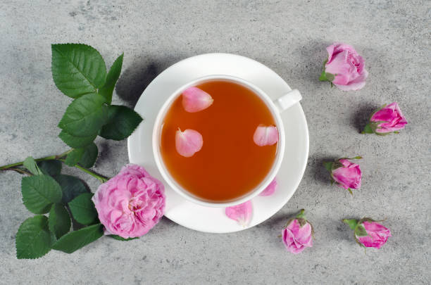 istock Cup of tea and rosebuds 1161196696