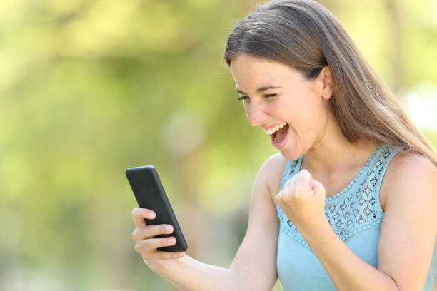istock Girl finding exciting online content on smart phone 1161199348