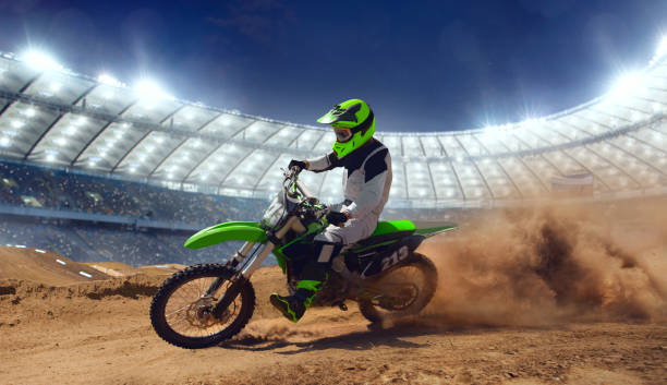 istock Motocross riders in action. 1161199364