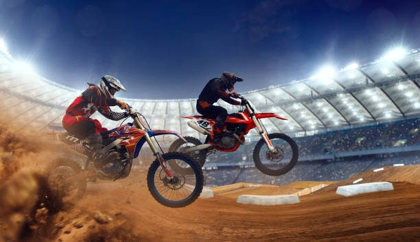istock Motocross riders in action. 1161199374