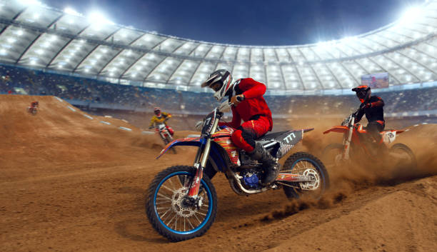 istock Motocross riders in action. 1161199410