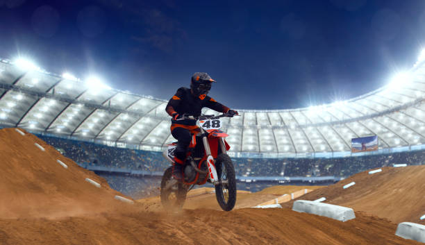 istock Motocross riders in action. 1161199581