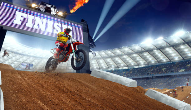 istock Motocross riders in action. 1161199630