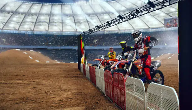 Motocross riders in action. Supercross. Motocross sport.