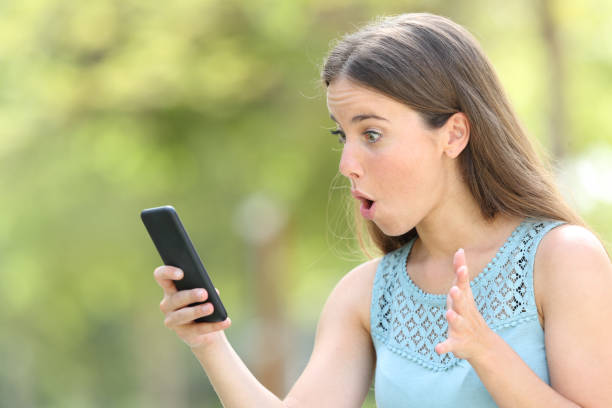 istock Girl finding surprising online content on smart phone 1161199737
