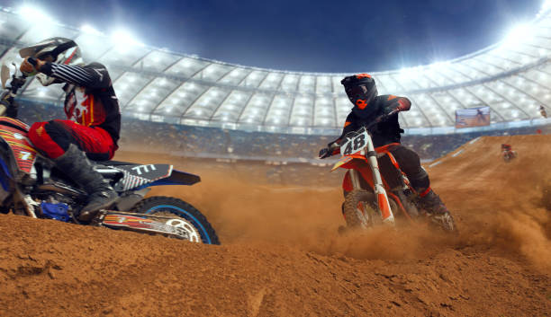 istock Motocross riders in action. 1161199974