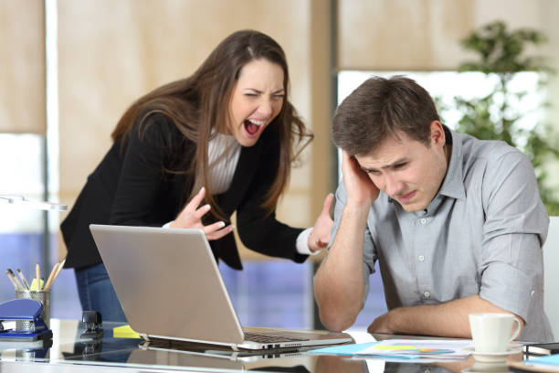 istock Businesswoman harassing an intern at office 1161199999